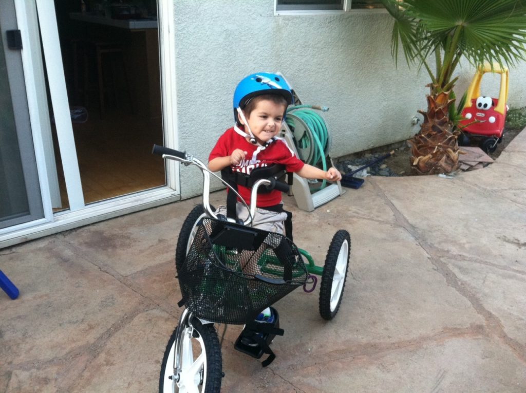 Jack Preader received his Adaptive Tricycle in 2013. Photo provided.
