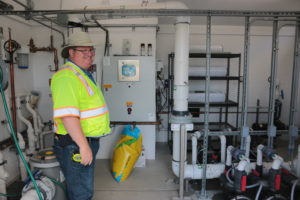 Mike Chambless showed Benitolink the pump room that will recycle 5,000 gallons of water throughout the new water feature at McCarthy Park. Photo by John Chadwell.