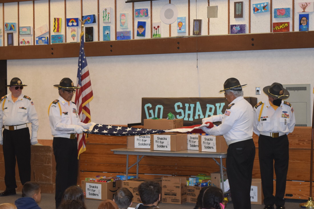 VFW members beginning the flag ceremony. Photo by Marisa Sachau.