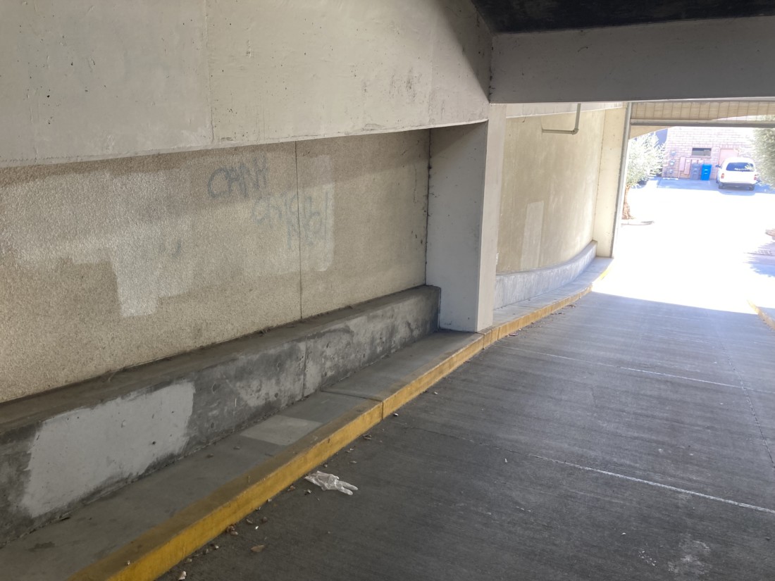 Tagging still visible near the Briggs Building garage entrance. It says "Can't catch me!" Photo by Noe MagaƱa.